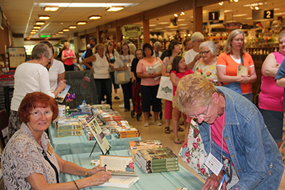 Wanda signing books in Shipshewana, Indiana.